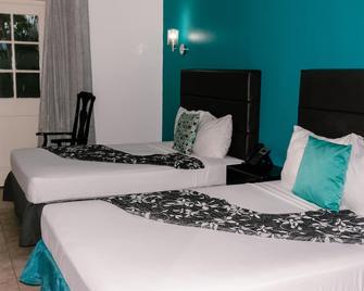Double Bed Garden and Pool View - Port Royal - Schlafzimmer