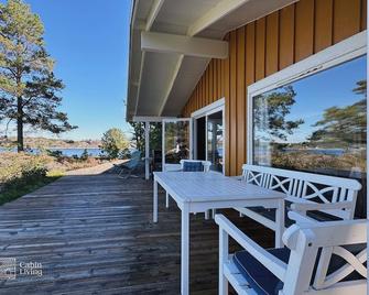 Seaside cabin with boat and beach in Kragerø - Kragerø - Patio