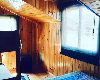 Hostal Andalue - Puerto Fuy - Спальня