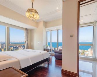 Yi Jia Seaview Serviced Apartment - Dalian - Habitación