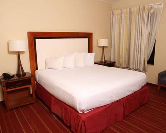 Days Inn by Wyndham Semmes/Mobile - Semmes - Bedroom