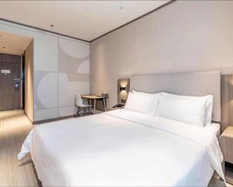 Hanting Hotel Yulin Development Zone Wanda Plaza - Yulin - Bedroom