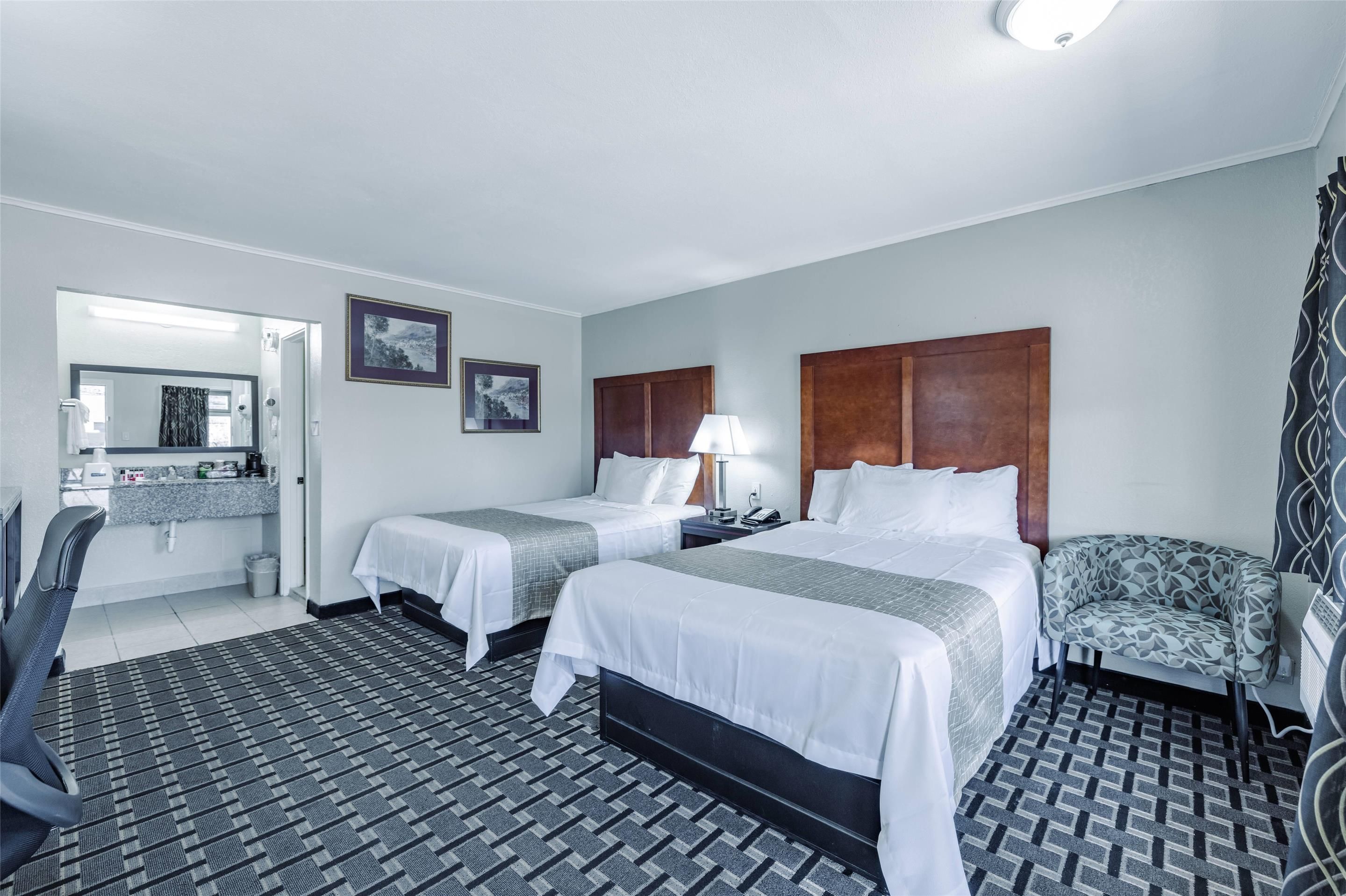 Travelodge by Wyndham Jackson I-40 Exit 82 - ג'קסון - חדר שינה