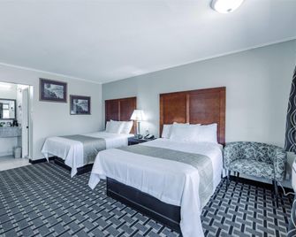 Travelodge by Wyndham Jackson I-40 Exit 82 - ג'קסון - חדר שינה