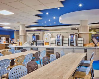 Kyriad Poitiers Jules Verne Site du Futuroscope - שאסנווי דו-פואטו - מסעדה