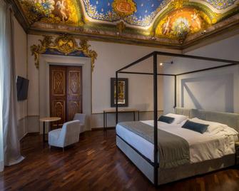 Hotel Bosone Palace - Gubbio - Makuuhuone