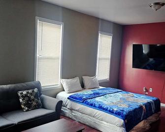 Divine Villa & Resorts Guest House - 283 Lehigh Ave - Newark - Sypialnia