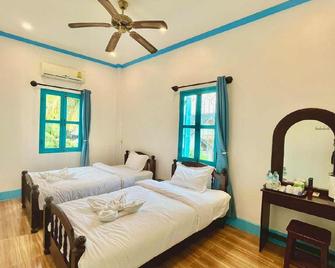 Kinnaly Guesthouse - Luang Prabang - Yatak Odası