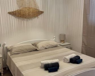 Charming 2-bedroom apartment with AC, WiFi in delightful Pittulongu - Pittulongu - Bedroom