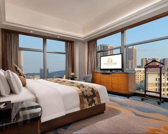 Grand Rezen Hotel Omiga - Chenzhou - Schlafzimmer