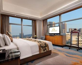 Grand Rezen Hotel Omiga - Chenzhou - Bedroom