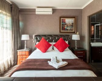 Lala Dene Lodge - Bloemfontein - Slaapkamer