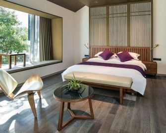 Yueqixi Huangshan Xibao B&B Cluster (Tunxi Old Street Branch) - Huangshan - Bedroom