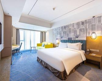 Holiday Inn & Suites Lanzhou Center - Lanzhou - Schlafzimmer
