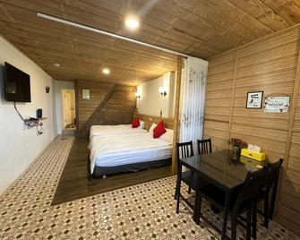 Jianan B&B - Ruifang District - Camera da letto