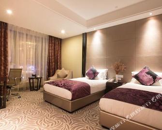Ningbo Nanyuan New City Hotel - Ningbo - Bedroom