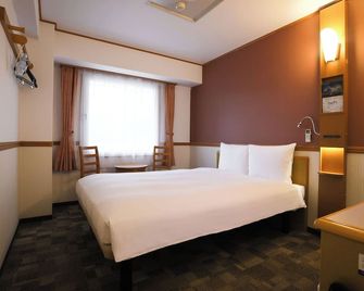 Toyoko Inn Kanazawa Kenrokuen Korimbo - Kanazawa - Bedroom