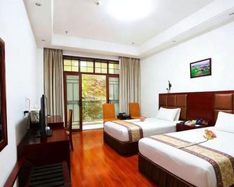 Jinggangshan Civil Aviation Hotel - Ji'an - Slaapkamer