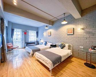 Mengzhige Hotels - Chengdu - Schlafzimmer