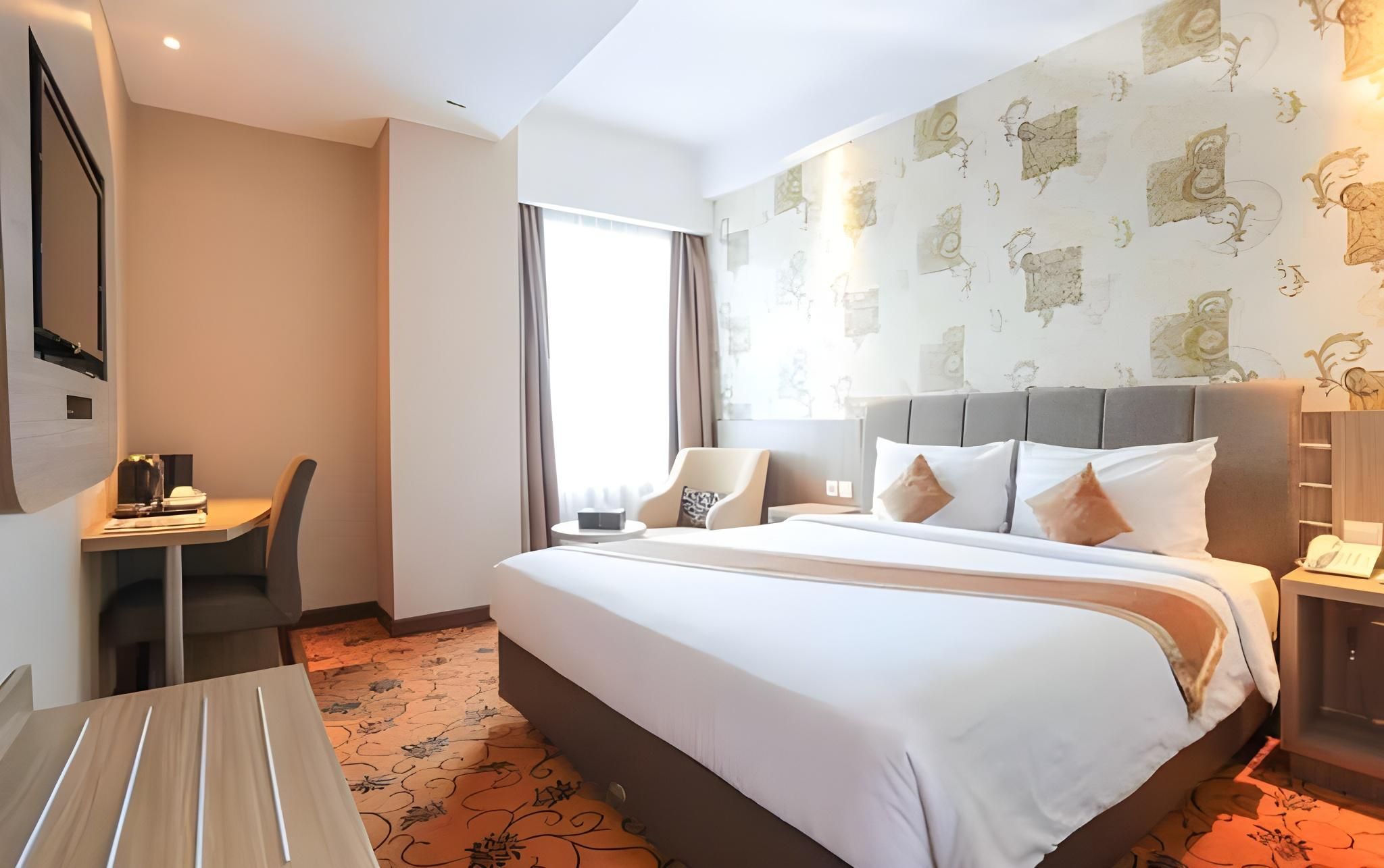 هوتيل ريمسي - ماكاسار - غرفة نوم