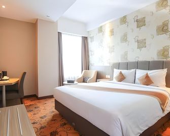 Hotel Remcy - Makassar - Bedroom