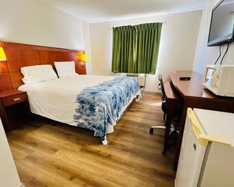 Rosewood Inn By OYO Union City I-69 - Union City - Bedroom