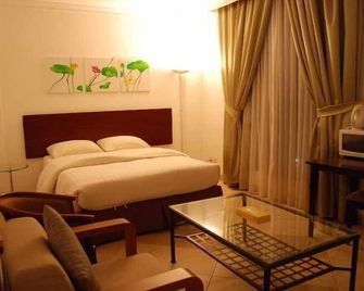 Times Square Suite Hotel - Ḩawallī - Habitación