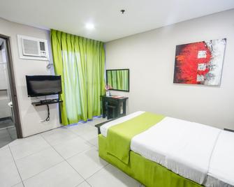 Jade Hotel & Suites - Manila - Phòng ngủ