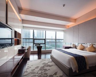 Ytour Serviced Apartment (Nanjing Olympic Sports Center Central Mansion) - Nanjing - Bedroom