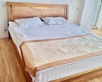 Negdelchin Hotel & Service Apartment - Ulã Bator - Quarto