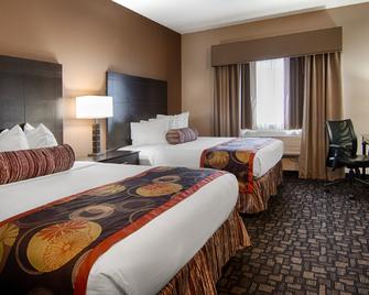 Best Western Plover-Stevens Point Hotel & Conference Center - Plover - Спальня
