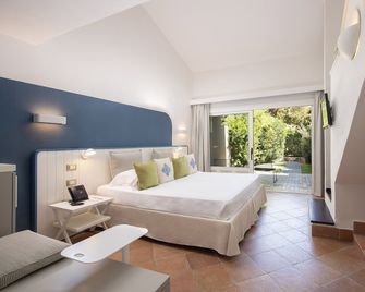Chia Laguna Hotel Village - Domus de Maria - Bedroom