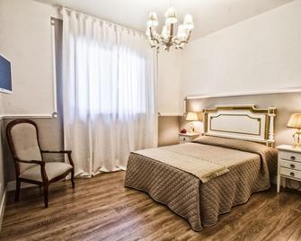 Relais Villa Le Bianche - Noci - Camera da letto