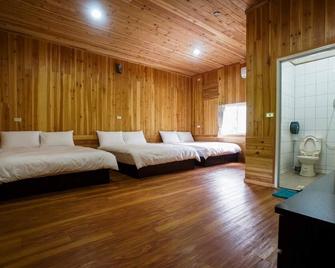 Hemerocallis Country House - Miaoli City - Camera da letto