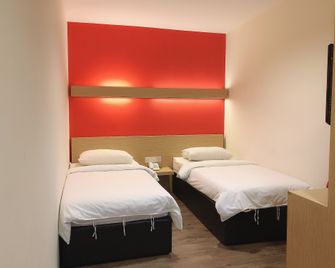 Tras Mutiara Hotel Bentong - Bentong - Schlafzimmer