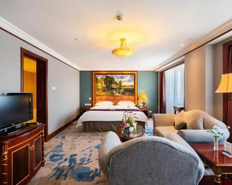 Golden Ocean Hotel - טיאנג'ין - חדר שינה