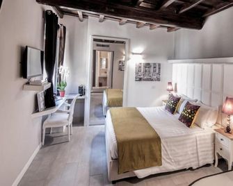 Corso Suite 107 Rooms Wellness & Spa - רומא - חדר שינה