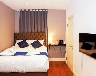 Putera Puteri Residence - London - Schlafzimmer