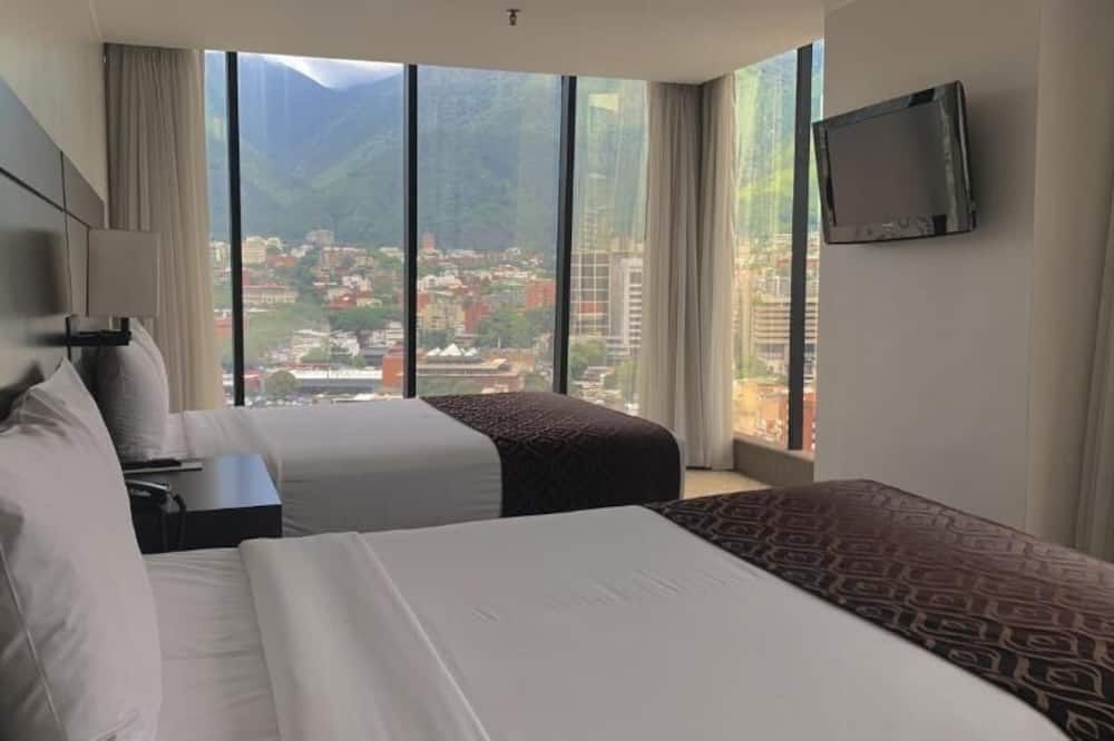 هوتل تشاكاو سويتس - كاراكاس - غرفة نوم