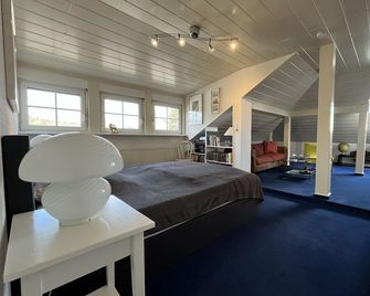 Cozy attic apartment in the Trift on the edge of the forest - Rüdesheim am Rhein - Bedroom