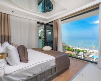 Simus Beach Hotel - Side - Bedroom
