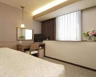 Niigata City Hotel - Niigata - Habitación