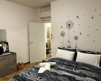Emilbo' House - San Lazzaro di Savena - Camera da letto