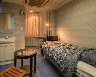 Izu Village Heso Hotel - Izunokuni - Schlafzimmer