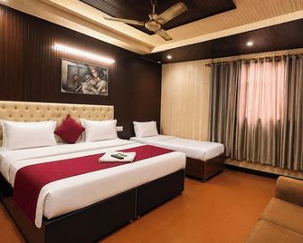 Hotel Red Hut - Chandigarh - Slaapkamer