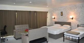 Galaxy Hotels & Apartments - Labasa - Habitación