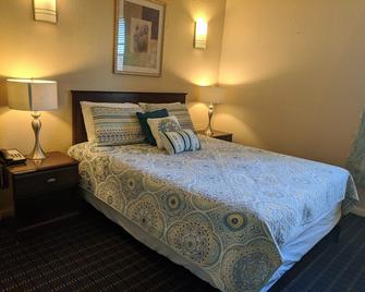 Athens Hotel & Suites - Houston - Bedroom