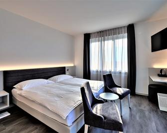 Hotel Luna Garni - אזקונה - חדר שינה