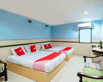 Hotel O Milion Inn - Мірі - Спальня