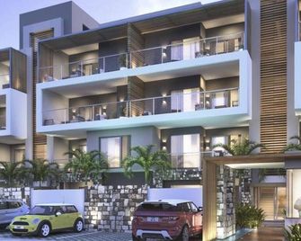 Charming apartment in Flic en Flac with shared pool - Flic en Flac - Building